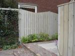 Landelijke schutting en bijpassend containerhok