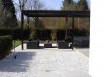 Moderne tuin met lounge terras en jacuzzi